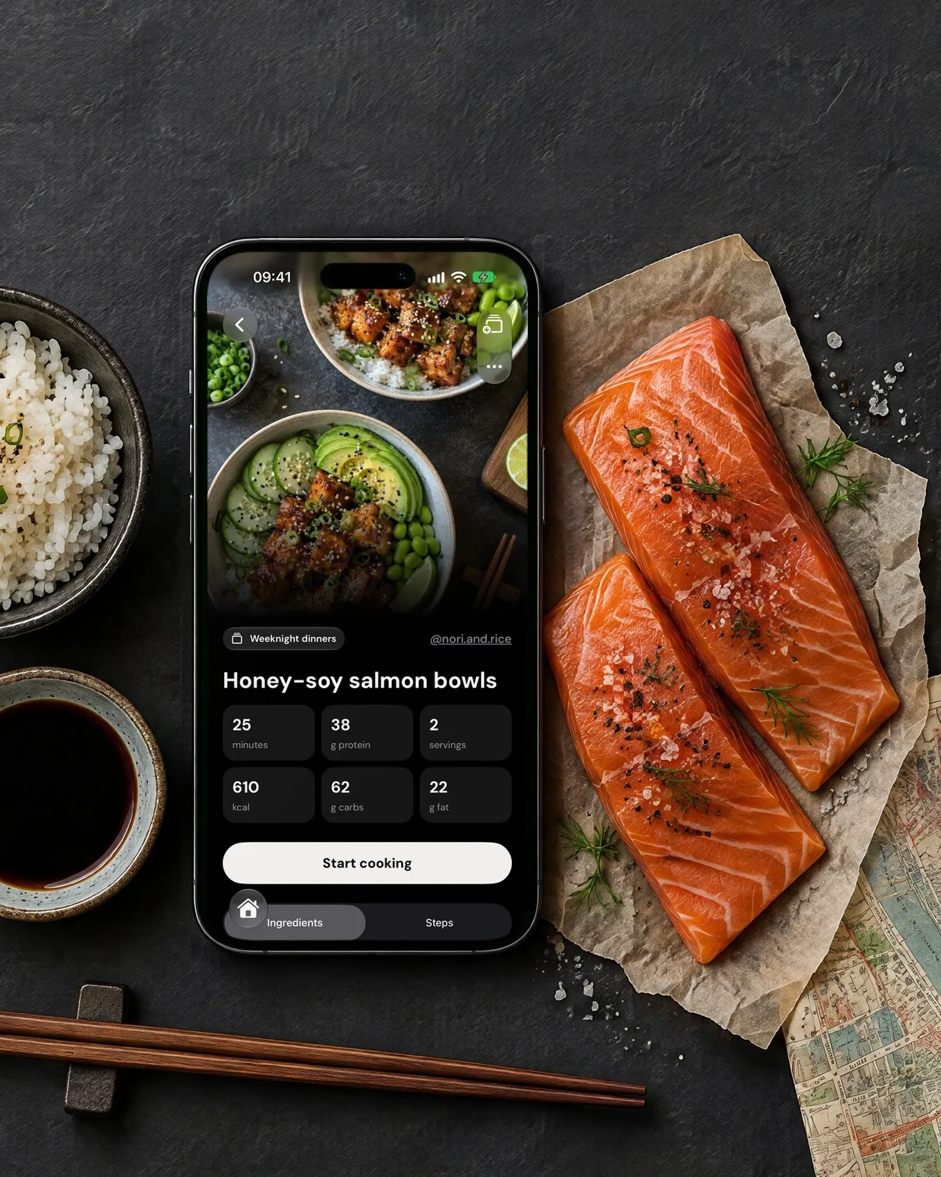 An iPhone showing a Smoosh recipe card for honey-soy salmon bowls, on a dark table between rice and raw salmon
